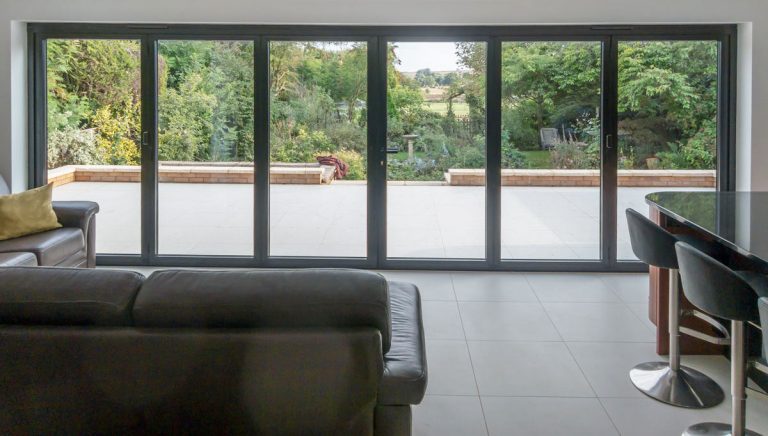minimalist design bi-fold doors | Omega Windows & Doors